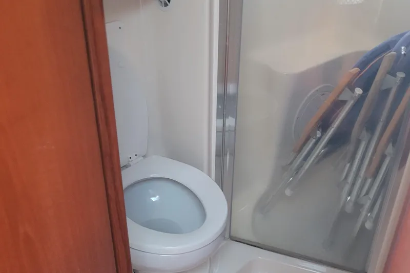 Slide: The Image of 2006 Tiara Yachts 4200 Open bathroom with toilet and shower area. - 42