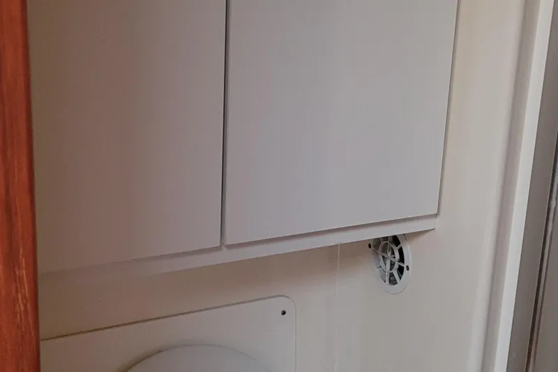 Slide: The Image of 2006 Tiara Yachts 4200 Open bathroom interior with cabinets and vent. - 45