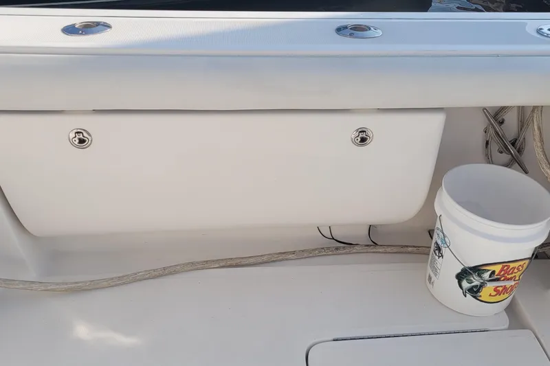 Slide: The Image of 2006 Tiara Yachts 4200 Open deck with storage compartment and fishing bucket. - 58