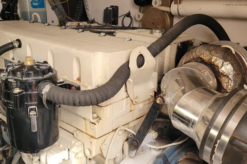 Slide: The Image of Engine compartment of a 2006 Tiara Yachts 4200 Open, showcasing mechanical components. - 62