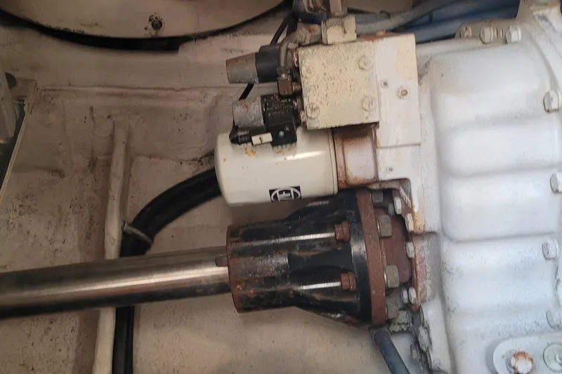 Slide: The Image of Engine component of a 2006 Tiara Yachts 4200 Open, showing mechanical parts and connections. - 63