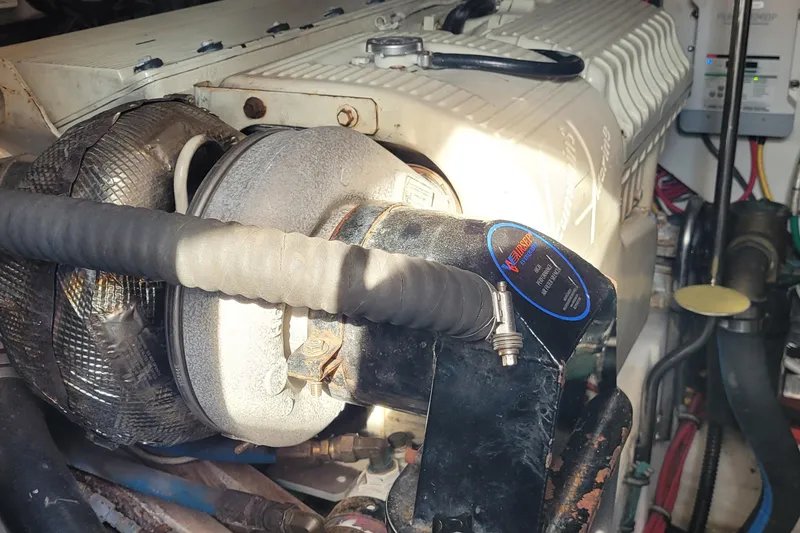 Slide: The Image of Engine compartment of a 2006 Tiara Yachts 4200 Open, showcasing mechanical components. - 65