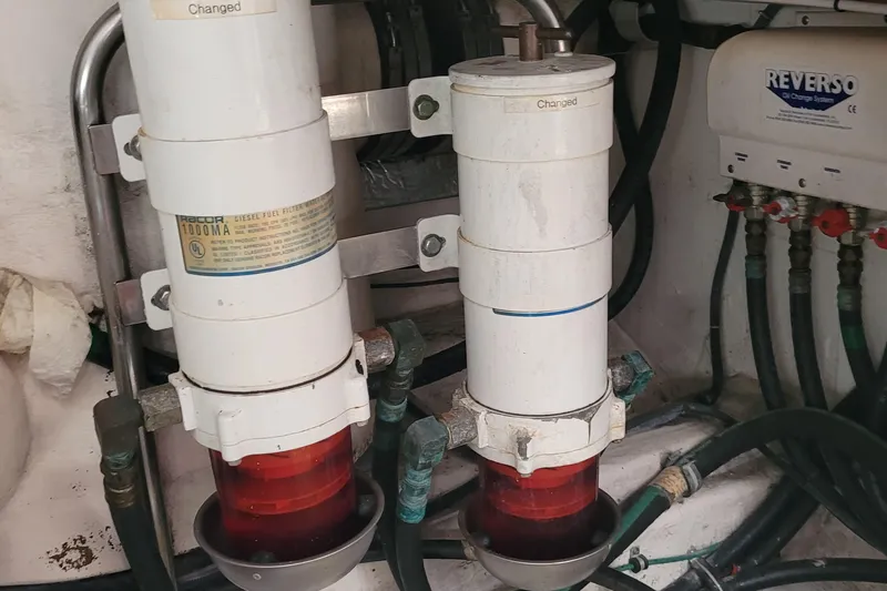 Slide: The Image of Engine room of 2006 Tiara Yachts 4200 Open with fuel filters and oil change system. - 69