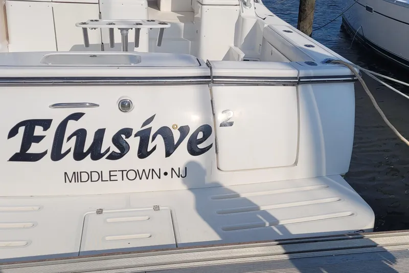 Slide: The Image of 2006 Tiara Yachts 4200 Open, named "Elusive 2," docked in Middletown, NJ. - 7