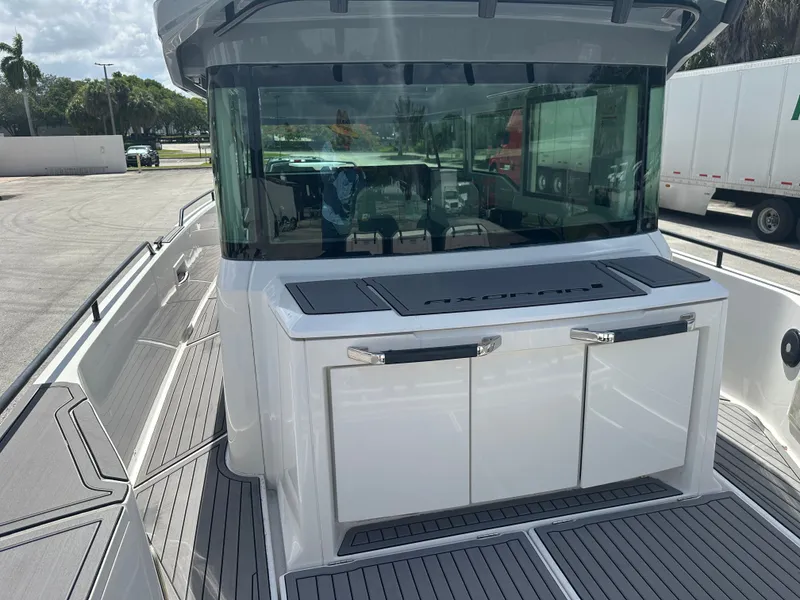Slide: The Image of 2020 Axopar 37 XC CROSS CABIN boat with sleek design and spacious deck. - 14