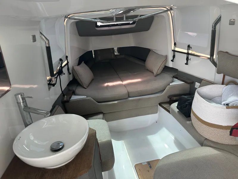 Slide: The Image of Interior of 2020 Axopar 37 XC CROSS CABIN with cozy seating and modern sink. - 41
