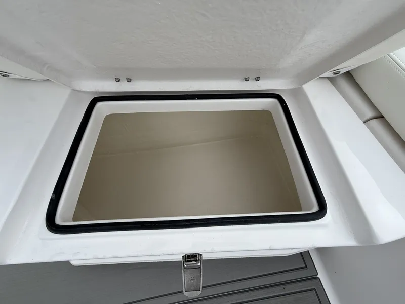 Slide: The Image of Open storage compartment on 2026 Twin Vee GFX2 260 GFX2 boat. - 17
