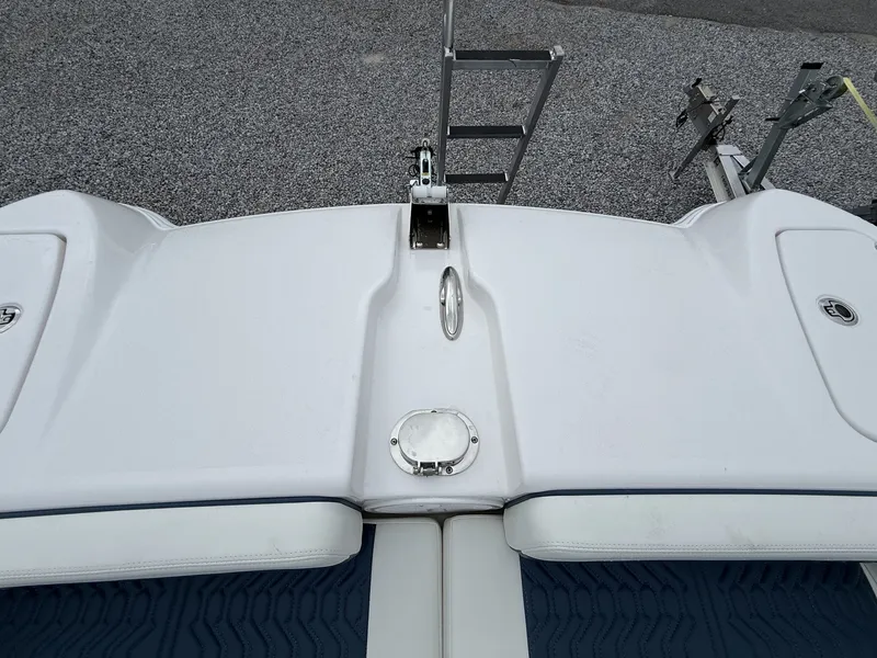 Slide: The Image of 2026 Twin Vee GFX2 260 boat deck with ladder and seating. - 18