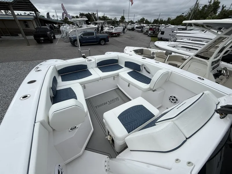Slide: The Image of 2026 Twin Vee GFX2 260 boat interior with spacious seating and modern design. - 5