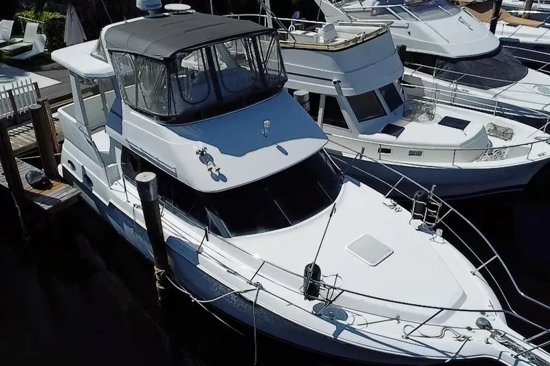Slide: The Image of 2003 Carver 356 Motor Yacht docked at marina, aerial view. - 4