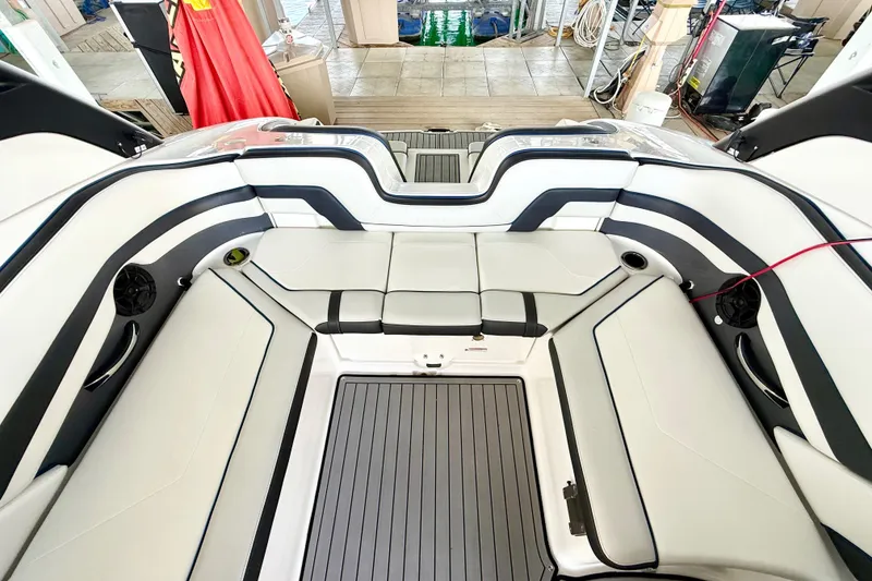 Slide: The Image of 2018 Yamaha Boats 242 Limited S E-Series interior with sleek seating and modern design. - 21