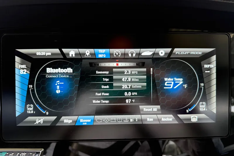 Slide: The Image of Yamaha Boats 2018 dashboard display showing trip info, fuel level, and Bluetooth connectivity. - 34
