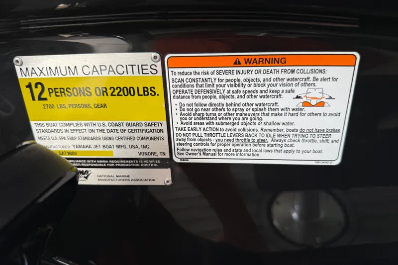 Slide: The Image of 2018 Yamaha Boats 242 Limited S E-Series capacity and safety warning labels. - 38