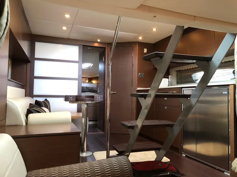 Slide: The Image of Luxurious interior of 2012 Sea Ray 450 Sundancer yacht with modern design and elegant furnishings. - 13