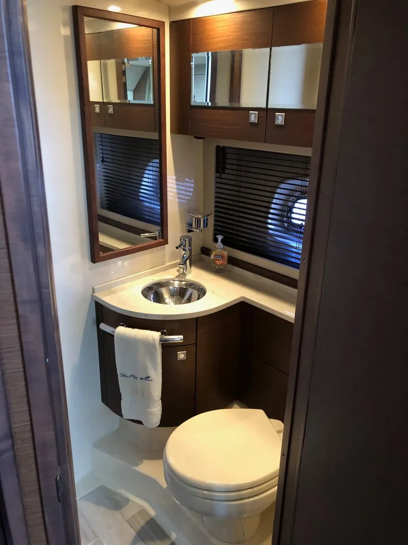 Slide: The Image of Luxurious bathroom in 2012 Sea Ray 450 Sundancer yacht with modern fixtures. - 22