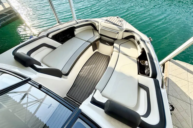 Slide: The Image of 2018 Yamaha Boats 242 Limited S E-Series interior with sleek seating and elegant design. - 14