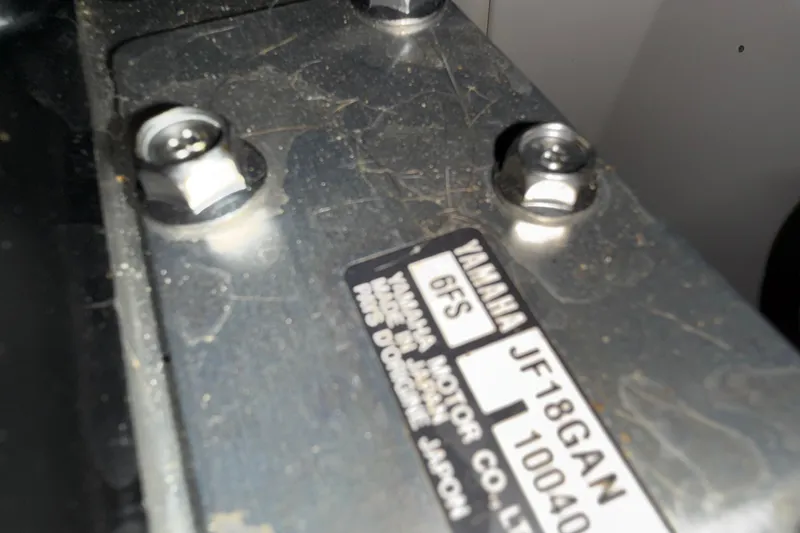 Slide: The Image of Close-up of Yamaha Boats 2018 model identification plate with bolts. - 23