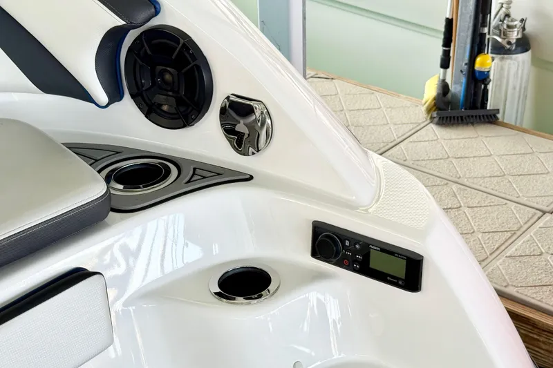 Slide: The Image of Interior of 2018 Yamaha Boats 242 Limited S E-Series, featuring speaker and control panel. - 7