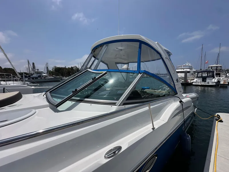 Slide: The Image of 2020 Monterey 355 Sport Yacht docked at marina under clear blue sky. - 11