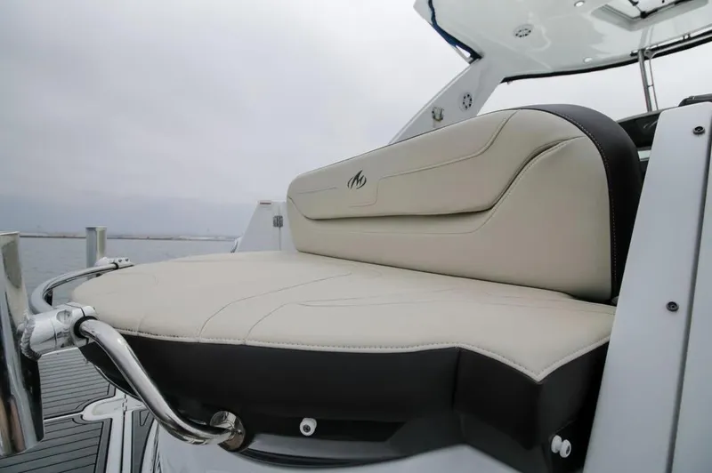 Slide: The Image of 2020 Monterey 355 Sport Yacht, beige seating detail, sleek design, luxury marine craftsmanship. - 17