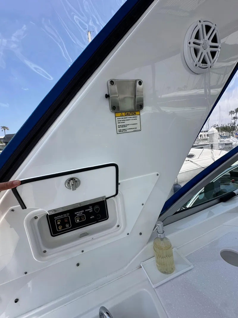 Slide: The Image of Control panel and speaker on 2020 Monterey 355 Sport Yacht, docked with clear sky background. - 29
