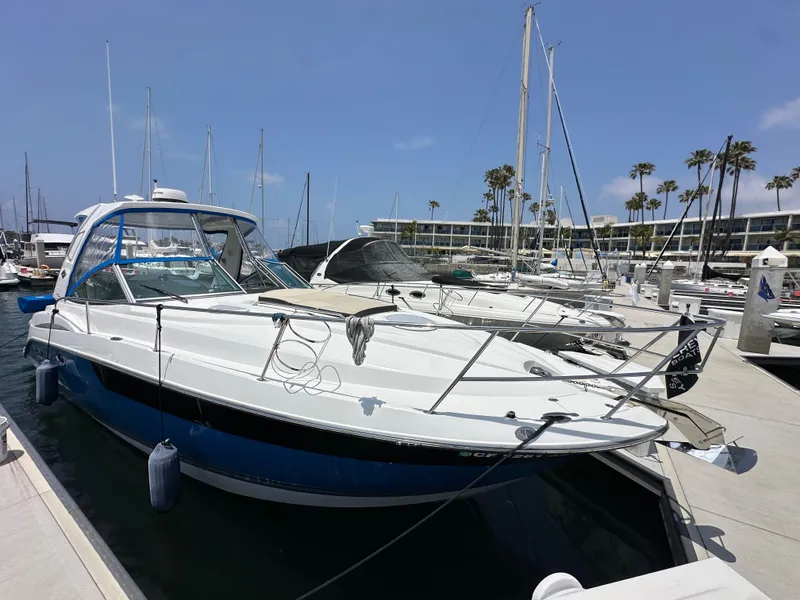 Slide: The Image of 2020 Monterey 355 Sport Yacht docked at marina under clear blue sky. - 3