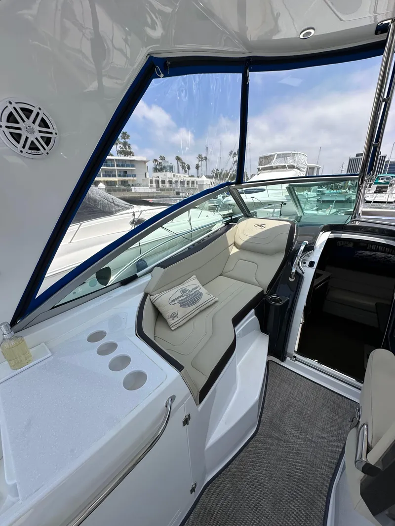 Slide: The Image of 2020 Monterey 355 Sport Yacht interior with plush seating and modern design. - 30