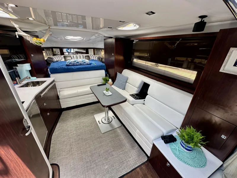 Slide: The Image of Luxurious interior of 2020 Monterey 355 Sport Yacht with modern seating and elegant decor. - 47