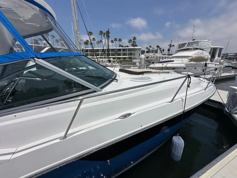 Slide: The Image of 2020 Monterey 355 Sport Yacht docked at marina under clear blue sky. - 6