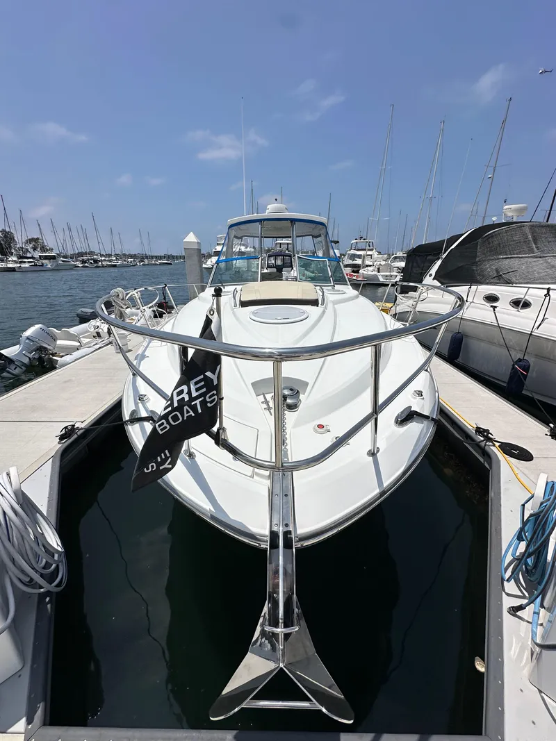 Slide: The Image of 2020 Monterey 355 Sport Yacht docked at marina under clear blue sky. - 9