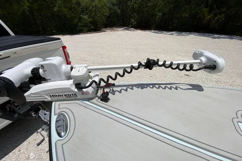 Slide: The Image of Minn Kota Terrova trolling motor on 2019 Cayo Boatworks 173, parked on gravel. - 23