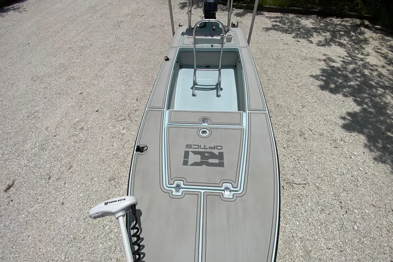 Slide: The Image of 2019 Cayo Boatworks 173 on gravel, featuring Minn Kota trolling motor. - 24