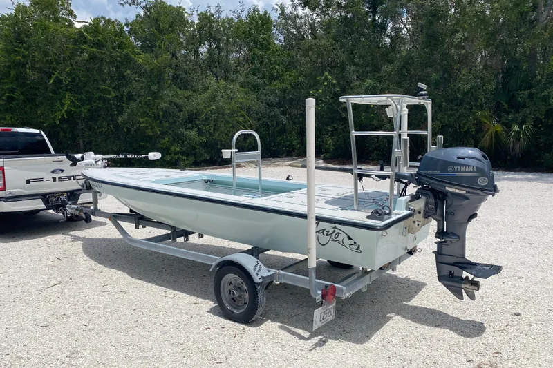 Slide: The Image of 2019 Cayo Boatworks 173 on trailer, attached to Ford F-150, with Yamaha outboard motor. - 3