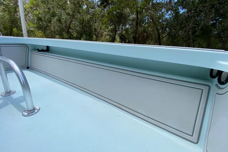 Slide: The Image of 2019 Cayo Boatworks 173 interior detail with light blue deck and railing. - 31