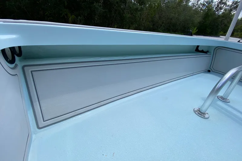 Slide: The Image of 2019 Cayo Boatworks 173 interior detail with light blue deck and stainless steel fittings. - 32