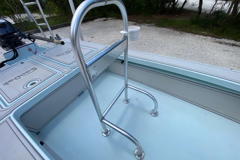Slide: The Image of 2019 Cayo Boatworks 173 interior with metal railing and cup holder. - 34