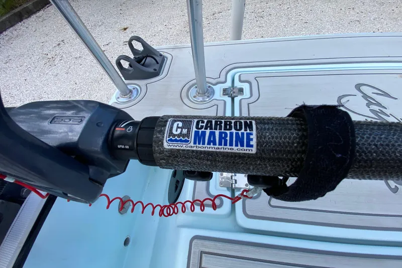 Slide: The Image of Carbon Marine handle on 2019 Cayo Boatworks 173, featuring a sturdy grip and safety cord. - 41