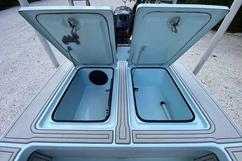 Slide: The Image of 2019 Cayo Boatworks 173 with open storage compartments on deck. - 42