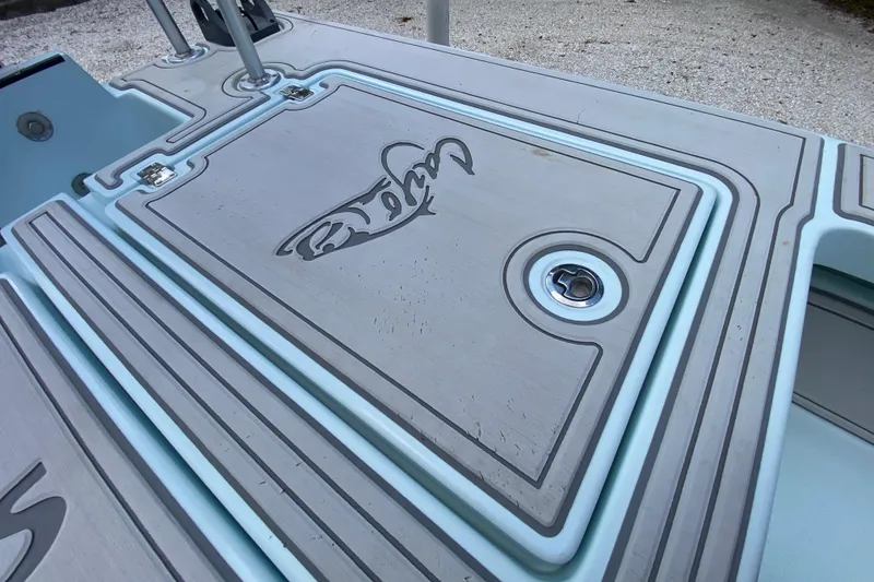 Slide: The Image of 2019 Cayo Boatworks 173 deck with custom logo and sleek design. - 43