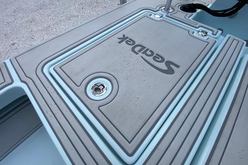 Slide: The Image of Cayo Boatworks 173, 2019 model, featuring SeaDek flooring detail. - 46