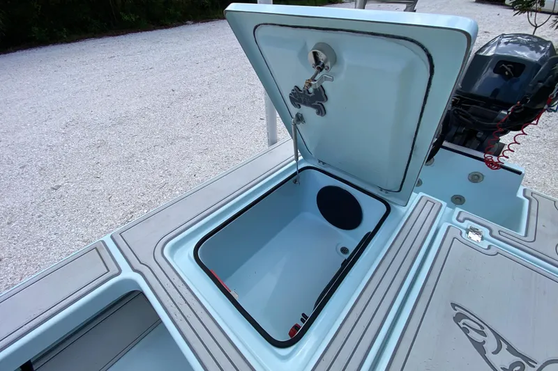 Slide: The Image of Open storage compartment on 2019 Cayo Boatworks 173, showcasing interior design and functionality. - 47