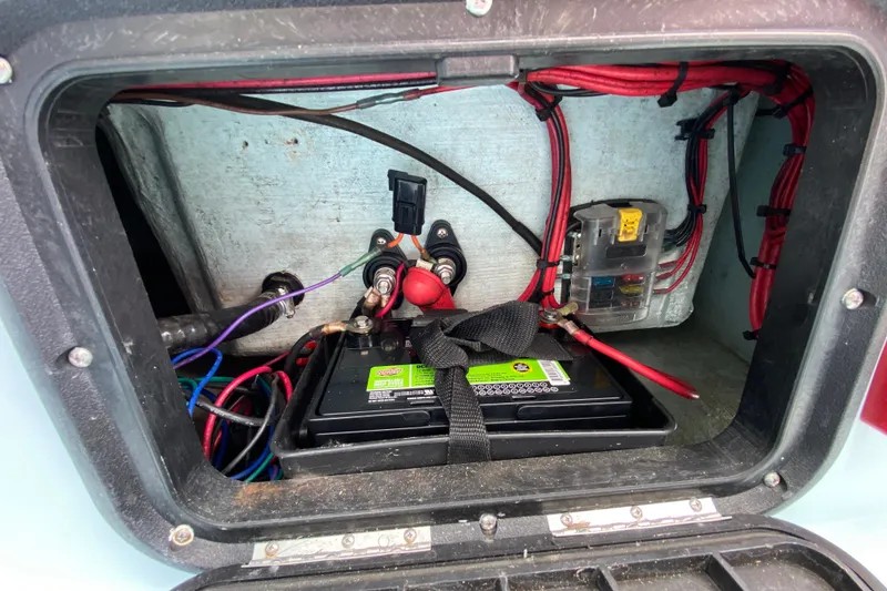 Slide: The Image of Battery compartment of 2019 Cayo Boatworks 173 with wiring and fuse box. - 51
