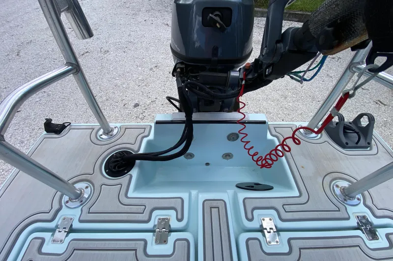 Slide: The Image of 2019 Cayo Boatworks 173 motor and deck details with stainless steel fittings. - 52