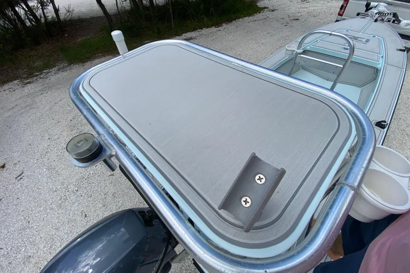 Slide: The Image of 2019 Cayo Boatworks 173, featuring a sleek deck and modern design elements. - 58