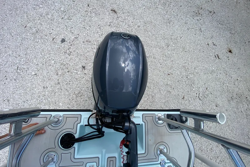 Slide: The Image of Top view of a 2019 Cayo Boatworks 173 with an outboard motor. - 59