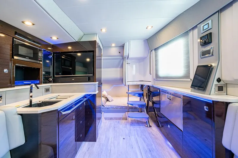 Slide: The Image of Luxurious interior of a 2019 Formula 430 Super Sport Crossover yacht with modern amenities. - 13