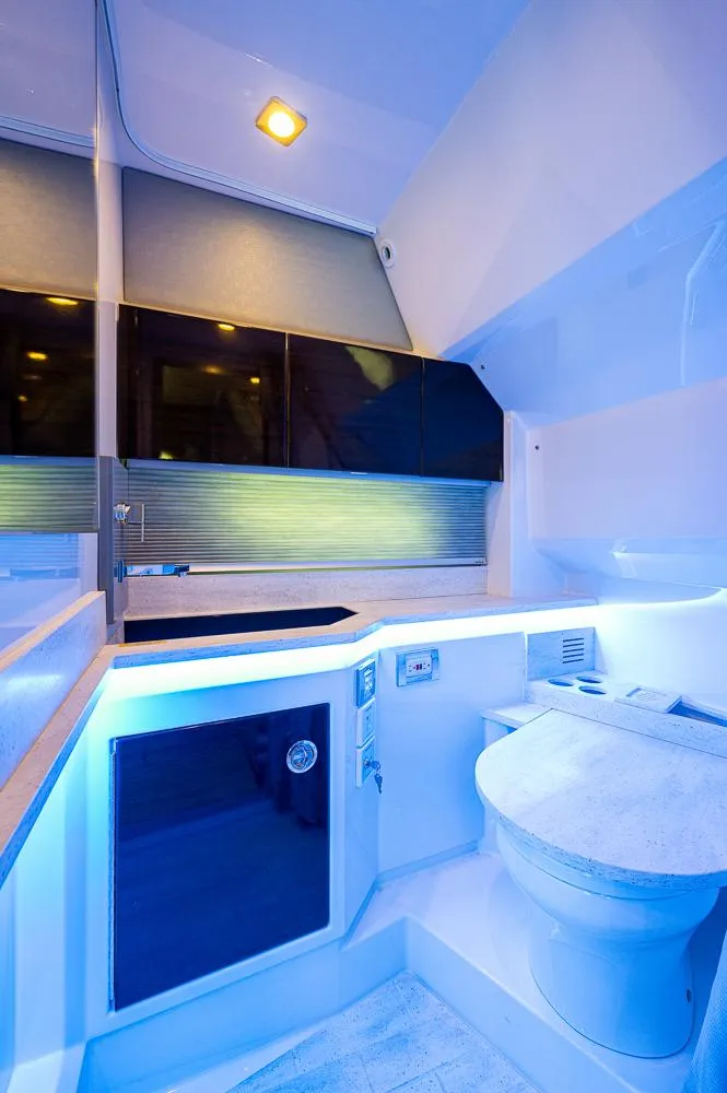 Slide: The Image of 2019 Formula 430 Super Sport Crossover bathroom with modern design and ambient lighting. - 18