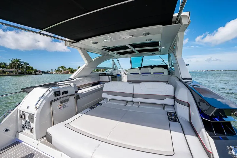 Slide: The Image of 2019 Formula 430 Super Sport Crossover luxury yacht interior with spacious seating and sleek design. - 27