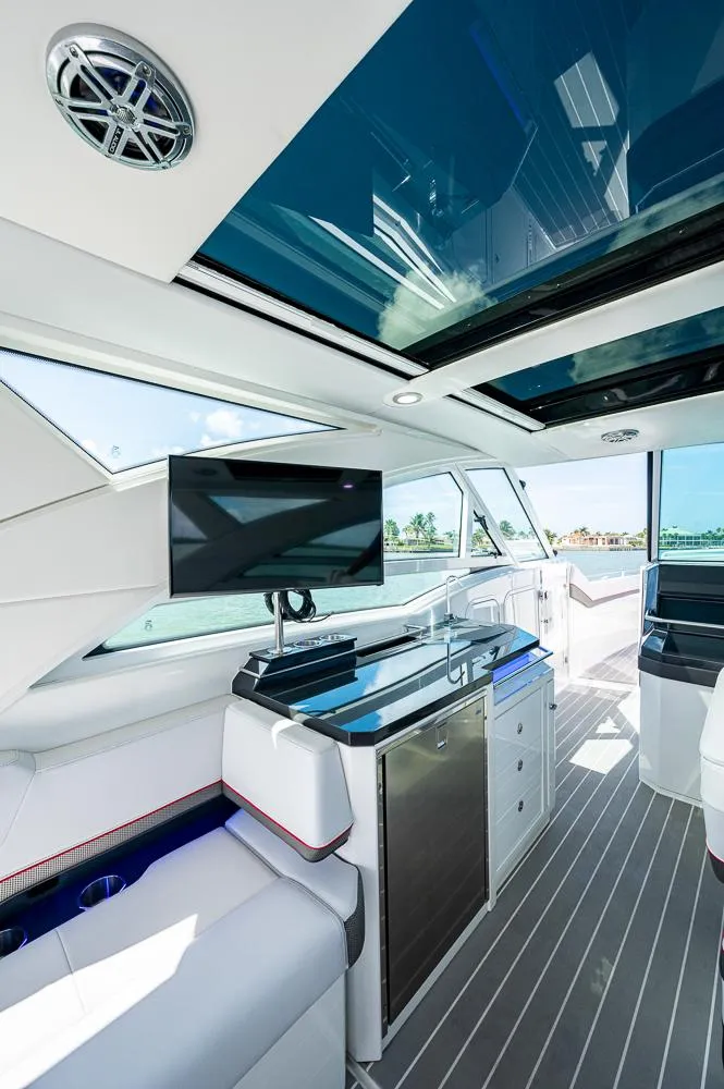 Slide: The Image of Interior of 2019 Formula 430 Super Sport Crossover yacht with modern amenities and sleek design. - 30