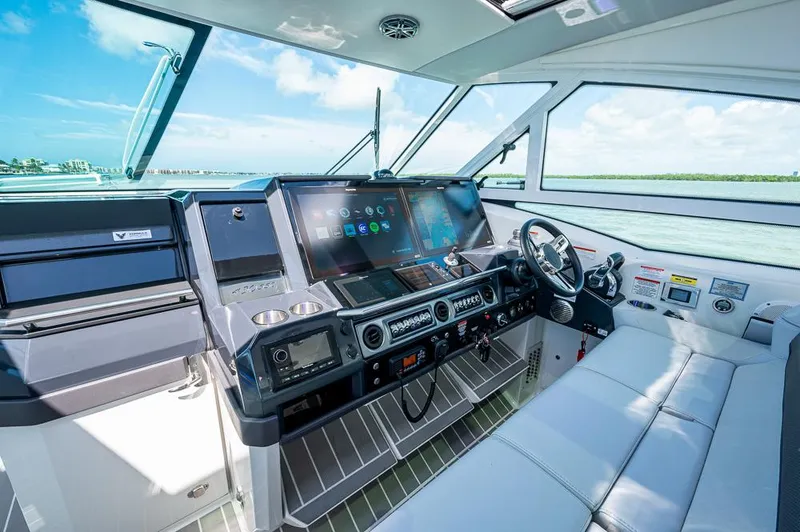 Slide: The Image of 2019 Formula 430 Super Sport Crossover helm with advanced navigation technology and luxurious seating. - 32